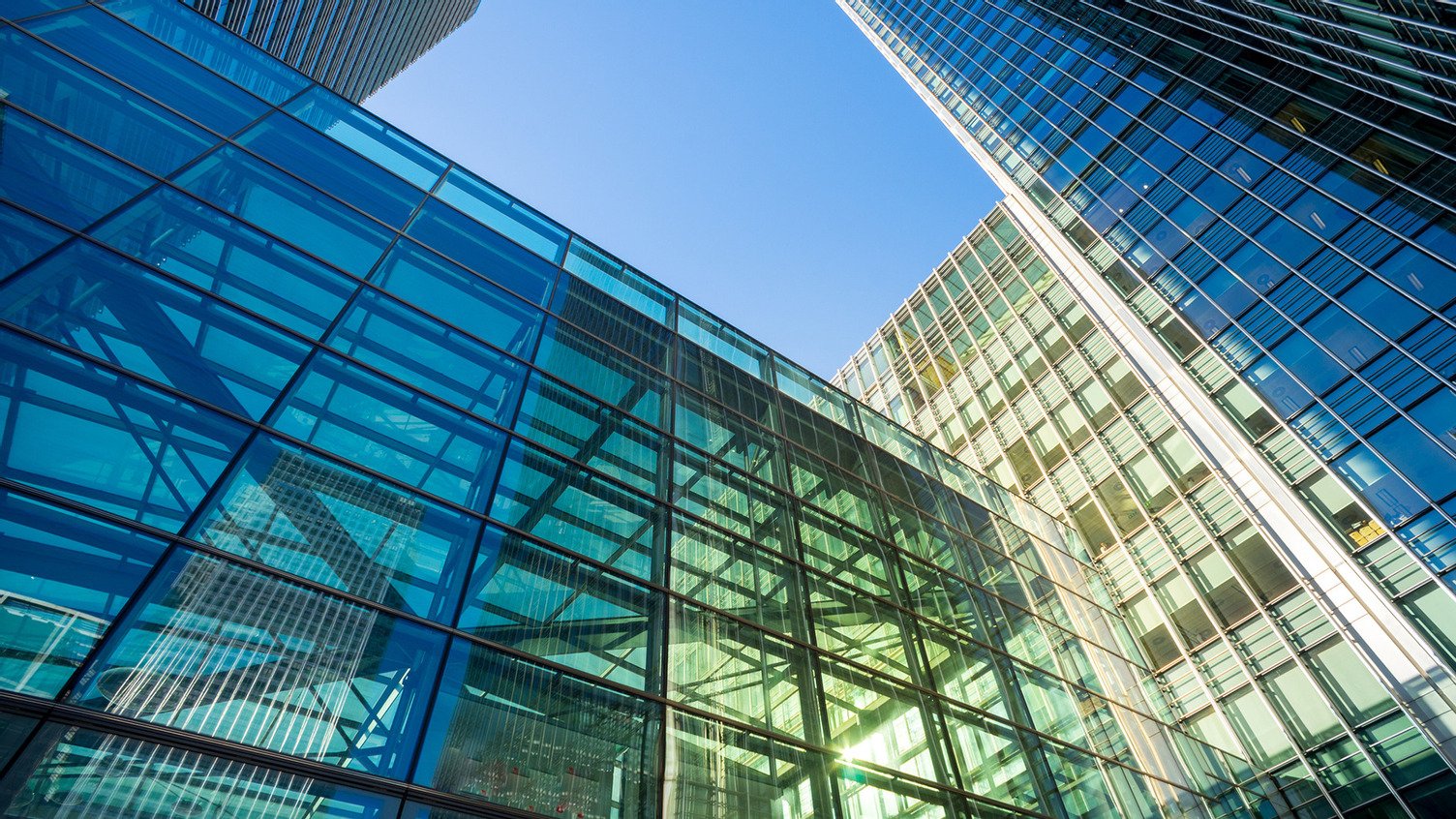 Modern commercial building in an urban setting, representing the starting point for exploring building products and solutions.