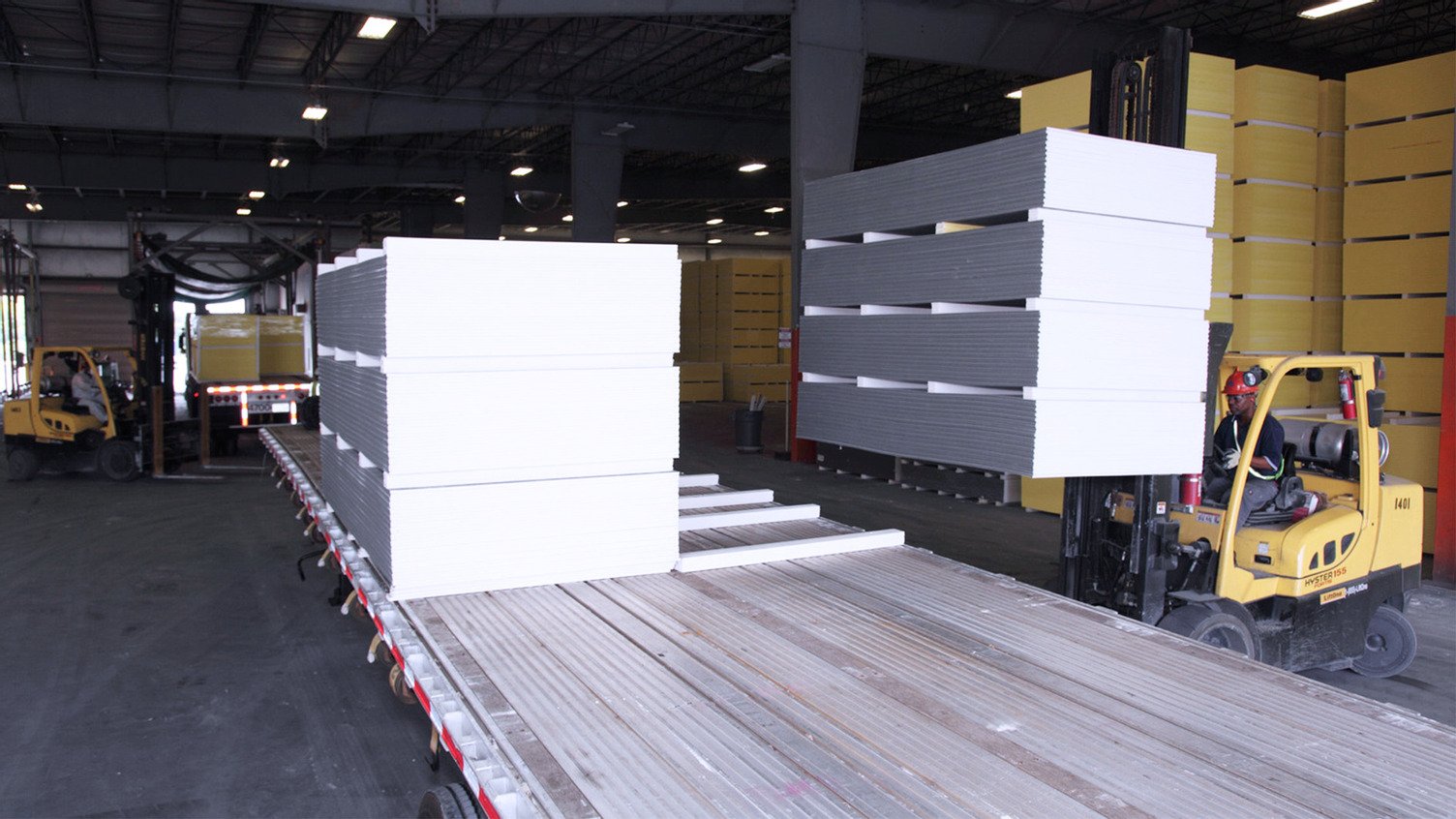 Exterior view of a commercial building under construction, representing locations where building materials can be purchased or sourced