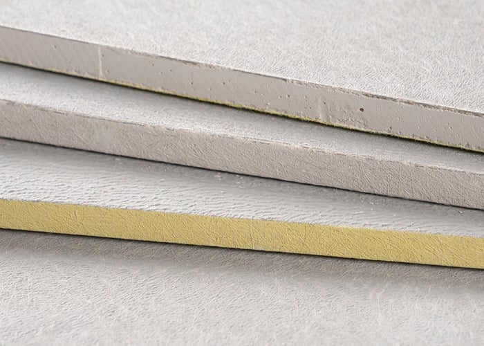 Detail view of layered DensShield® Tile Backer panels showing textures and core materials for comparison of backer board products.